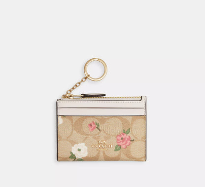 Coach Outlet- Mini Skinny Id Case In Signature Canvas With Floral Print *PREORDEN*